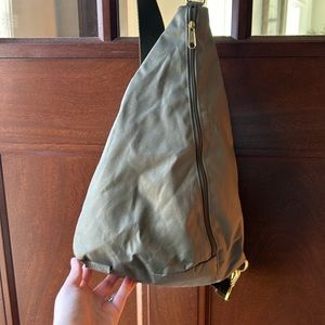 Canvelle army green sling bag. Gold hardware.